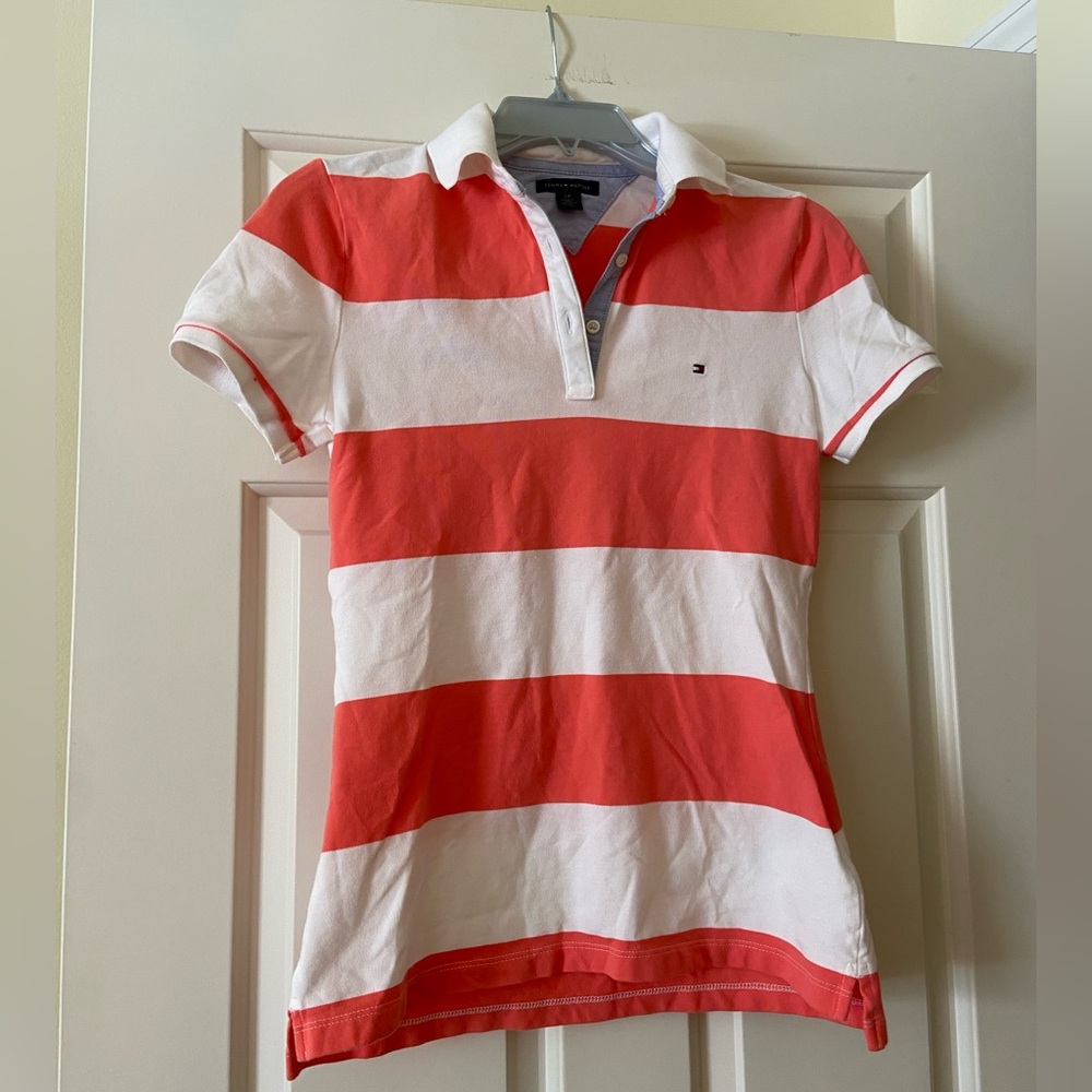 Melon and white striped polo shirt